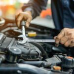 auto mechanic repairing car engine auto repair shop car service maintenance concept 981948 16079