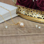caged pearl necklace