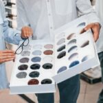 bunch replaceble lenses man woman glasses store helping choose product 146671 74069