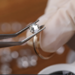 stock photo jeweler install loose cut moissanite color round brilliant in ring diy material diamond against 1575499156 ezremove