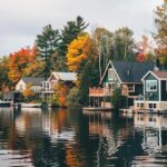charming lakeside cottages surrounded by vibrant fall foliage serene environment 607202 33490