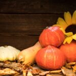 arrangement with pumpkins sunflower wooden background 1