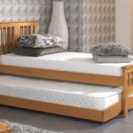 What Are the Benefits of Upholstered Guest Beds Over Standard Beds?