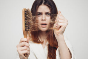 Hair Fall at a Young Age: Causes, Treatment and When to Think About a Transplant