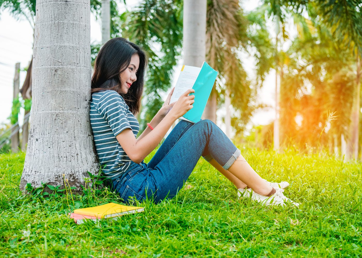Asian girl reading coming of age novels books for teens