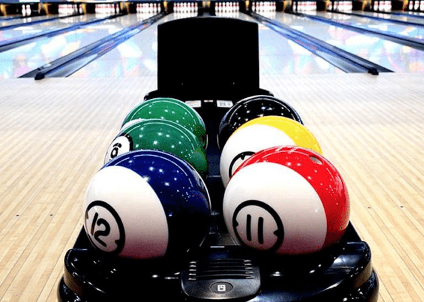 Colourful bowling balls at the alley