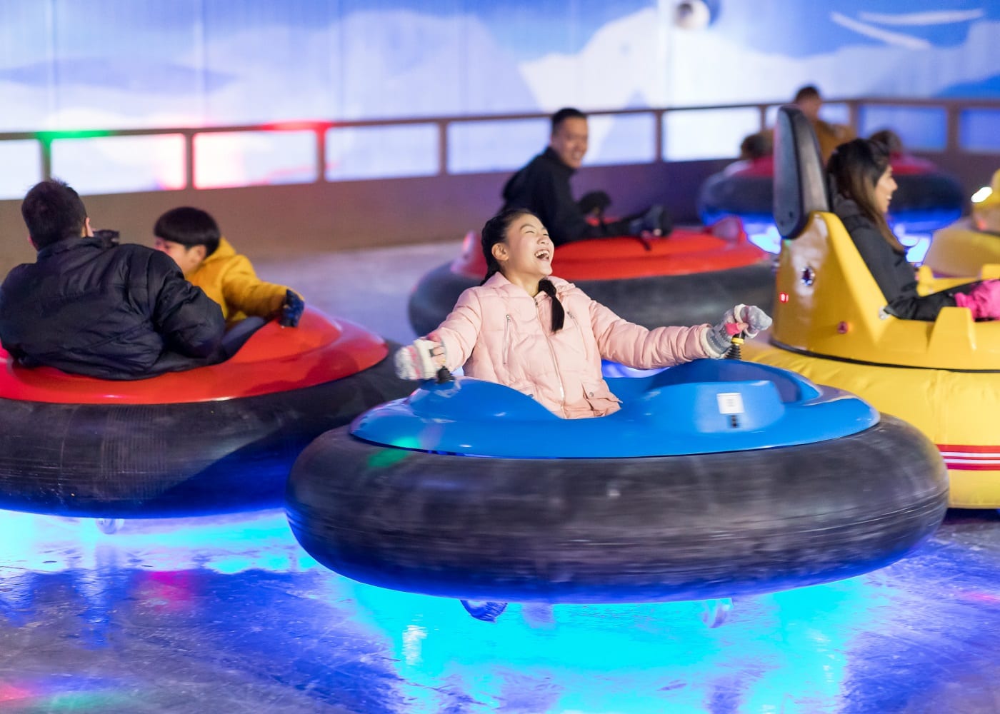 Drift on ice at Snow City - cold places to chill out with kids in Singapore