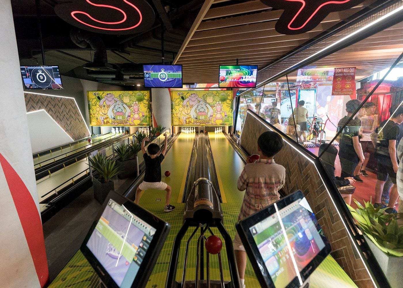Kids bowling at Timezone Vivocity