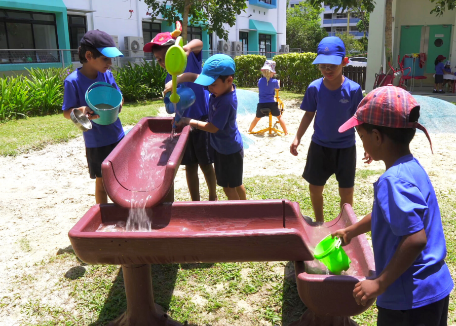 students playing at OWIS