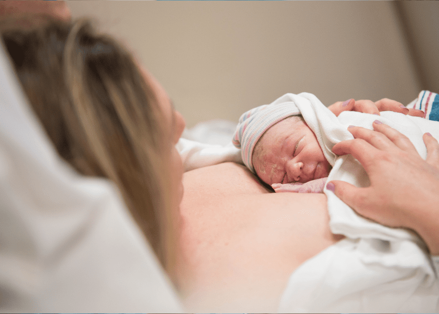 new born baby natural birth with mother