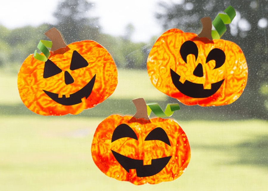 Melted crayons pumpkin suncatcher by The Best Ideas For Kids | Halloween crafts for kids