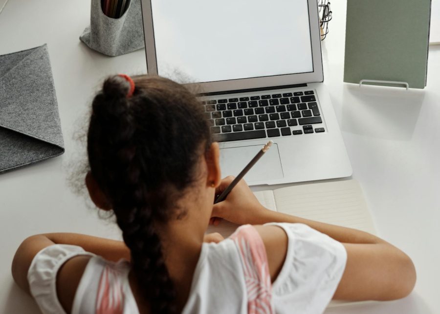 child studying homework