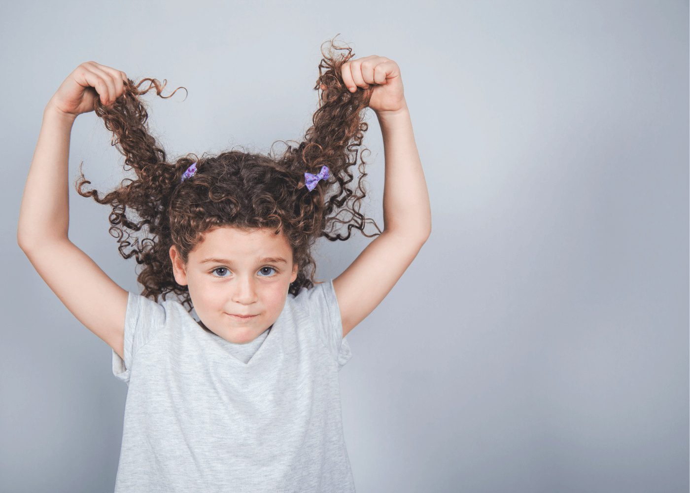 Tame curly hair in Singapore’s humidity with pro tips, curl products, and top salons