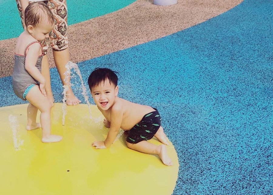 Kids playing with water fountain at Serangon