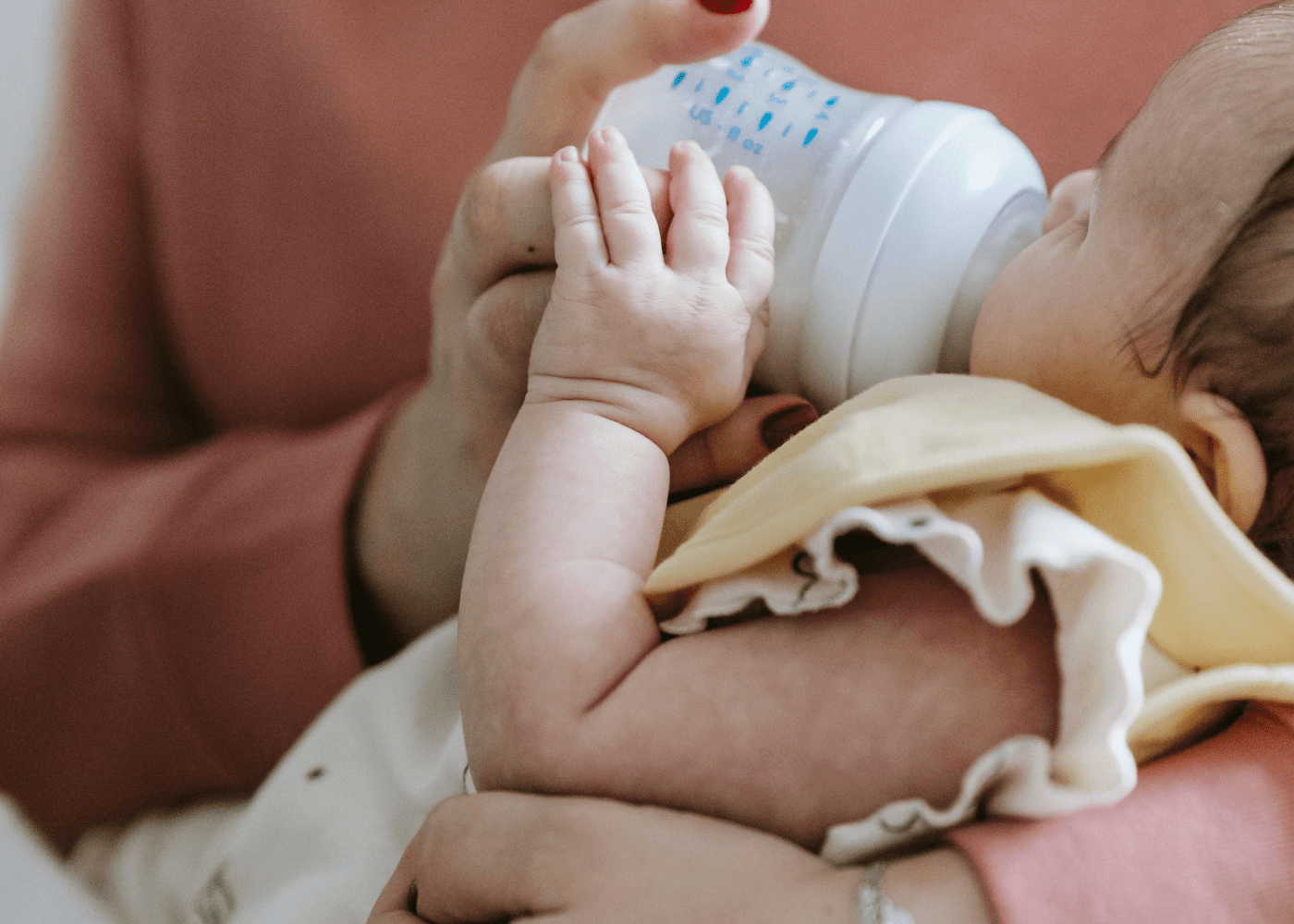 Sarah Chai via Pexels baby bottle feeding