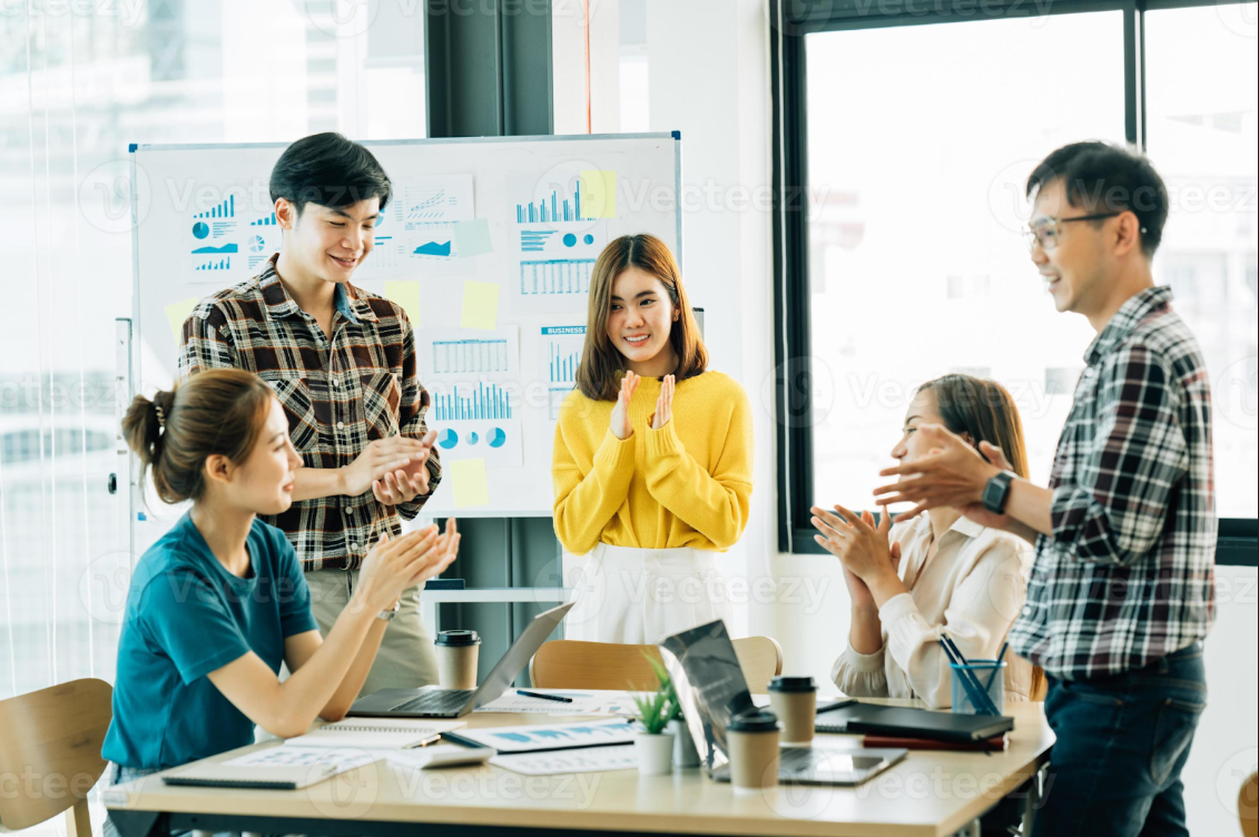 A group of people in a meeting, mid-discussion