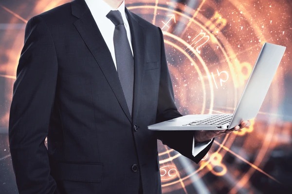 imgi 207 businessman stands laptop on background 600nw 1852130446