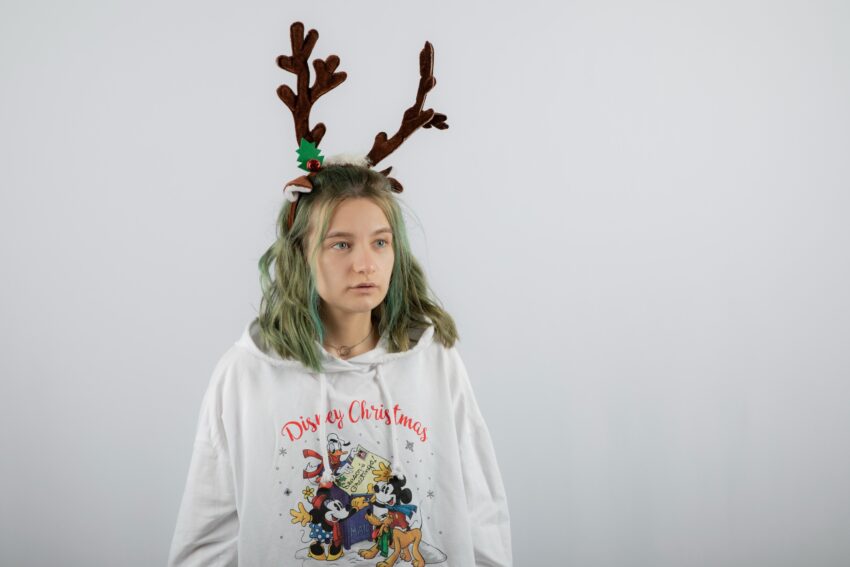 young woman model standing against white 1 1