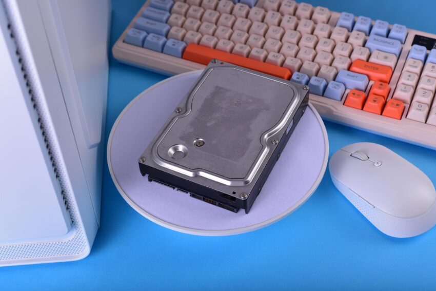 compressed minimalist tech setup with old hard disk