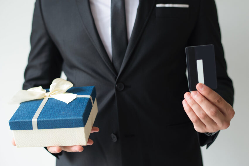 close up businessman buying chri 1