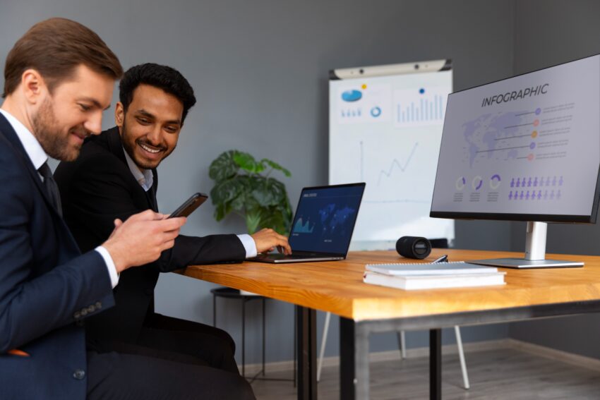 compressed business person looking finance graphs