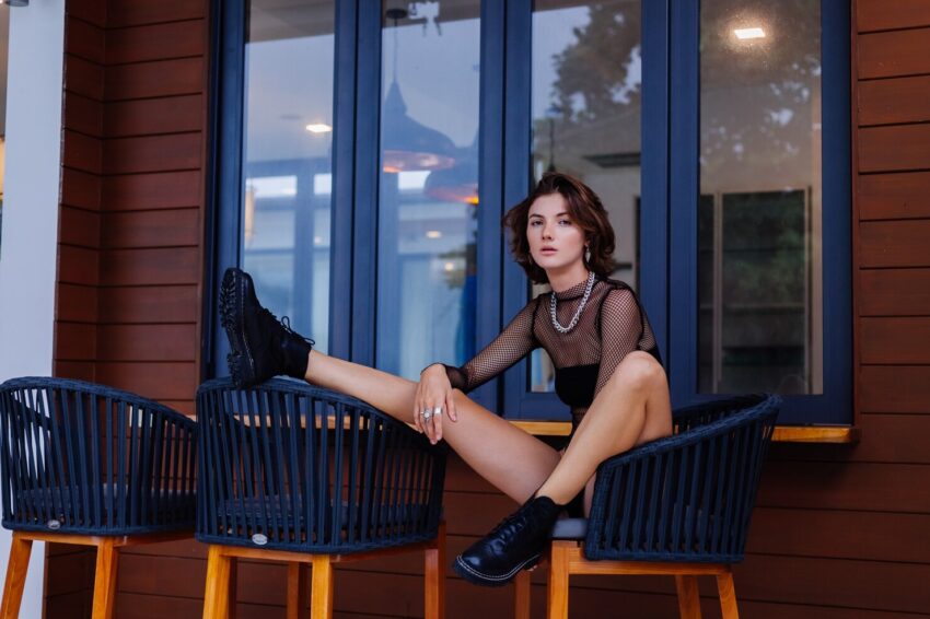 fashion portrait stylish caucasian villa body suit black boots outside villa 343596 1799