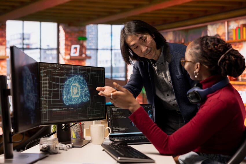 cto manager multiethnic startup office helps technician coding advanced ai1