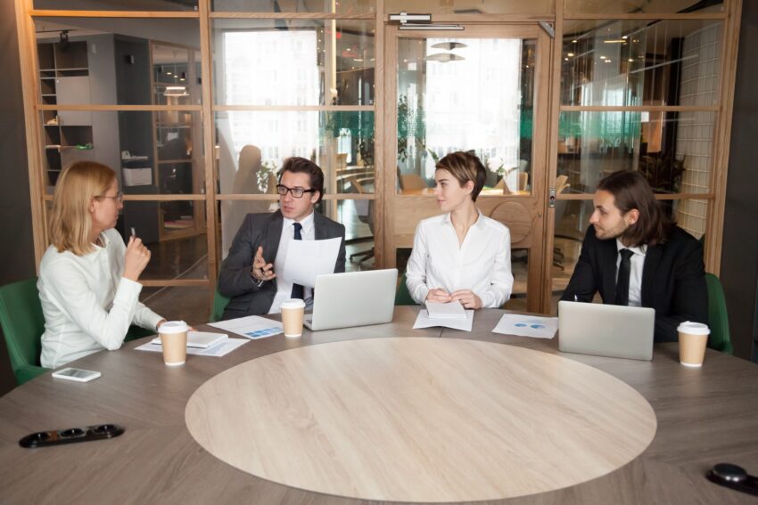 business people discussing new design project executive team meeting 1