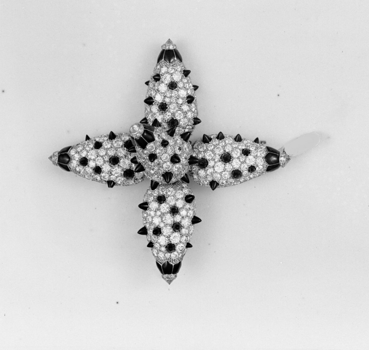 Archives photograph of a brooch - THE EDGE SINGAPORE