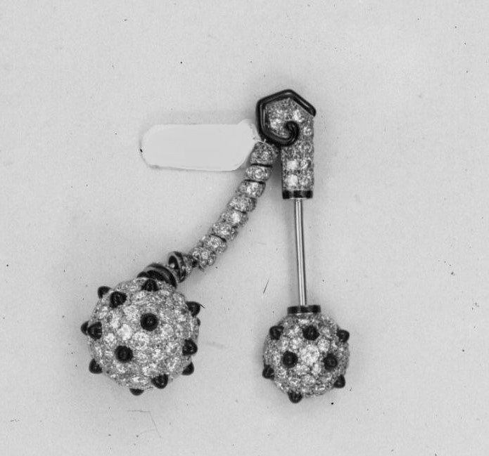 Archives photograph of a brooch - THE EDGE SINGAPORE