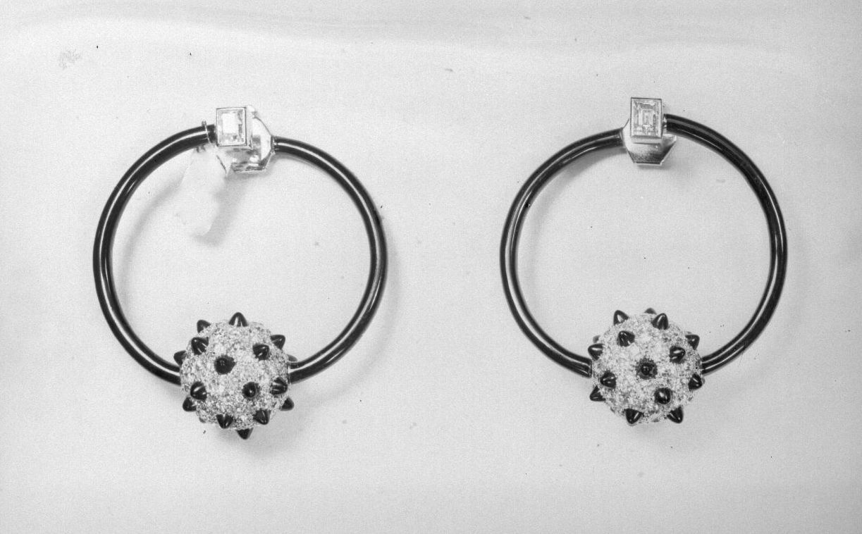 Archives photograph of pendant earrings - THE EDGE SINGAPORE