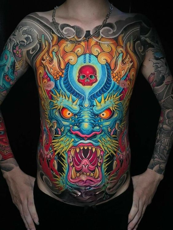 hình xăm đầu rồng xanh kín bụng