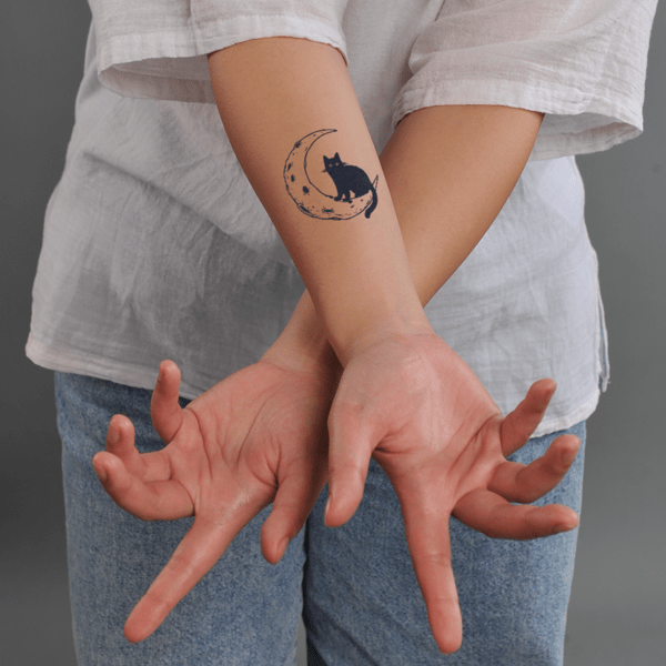 1_3__10__d3b9200cef0344b5889eb86a23c029cc_grande Hình xăm mặt trăng và mèo